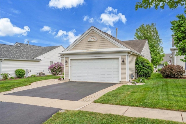 13569 Winterberry Ln, Huntley, IL 60142 - view of front of home featuring a front lawn, driveway, and an attached garage
