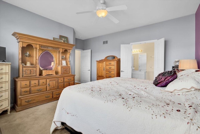 13569 Winterberry Ln, Huntley, IL 60142 - bedroom with light carpet, connected bathroom, and a ceiling fan