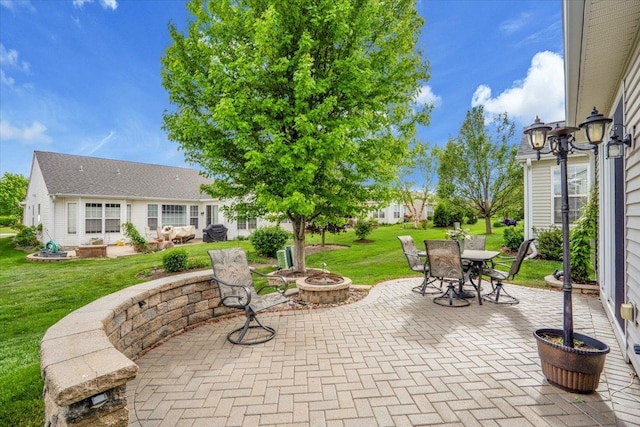 13569 Winterberry Ln, Huntley, IL 60142 - view of patio with an outdoor fire pit and outdoor dining area