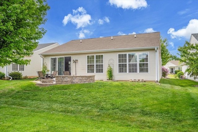 13569 Winterberry Ln, Huntley, IL 60142 - rear view of property with a lawn and a patio
