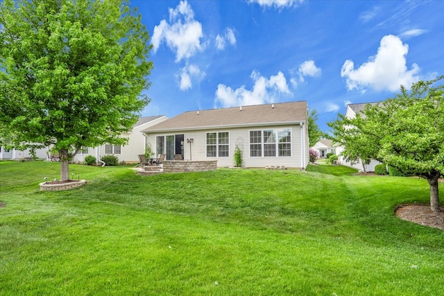 13569 Winterberry Ln, Huntley, IL 60142 - back of property with a yard and a patio area