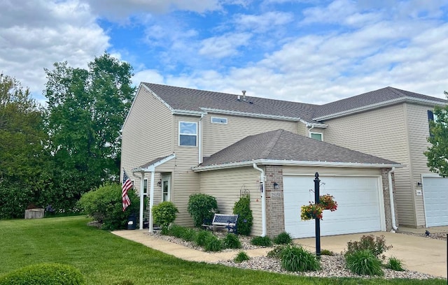 25159 Faraday Rd, Manhattan, IL 60442 - view of property exterior with concrete driveway, a garage, a yard, and roof with shingles