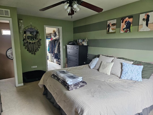 25159 Faraday Rd, Manhattan, IL 60442 - bedroom with carpet flooring, a closet, a walk in closet, and ceiling fan
