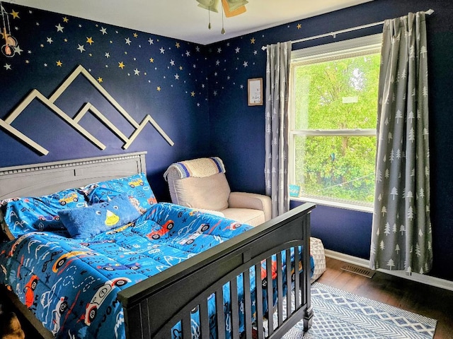 25159 Faraday Rd, Manhattan, IL 60442 - bedroom with baseboards, wood finished floors, and wallpapered walls