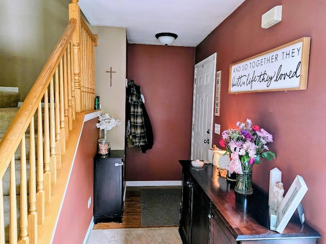 25159 Faraday Rd, Manhattan, IL 60442 - doorway to outside featuring stairs, wood finished floors, and baseboards