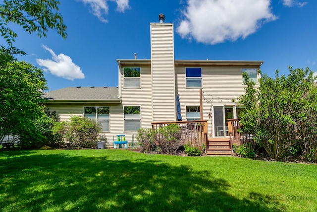 1441 Sutton Pl, Gurnee, IL 60031 - rear view of house featuring a chimney, a deck, and a yard