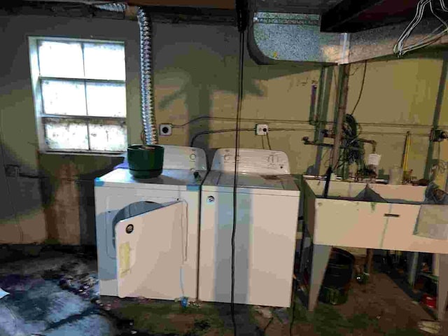2856 W Touhy Ave Unit C, Chicago, IL 60645 - basement with washing machine and dryer and a sink