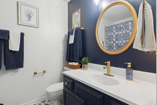 1034 Willoby Ln, Elgin, IL 60120 - bathroom featuring toilet, vanity, and baseboards