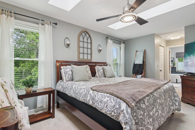 1034 Willoby Ln, Elgin, IL 60120 - bedroom with a skylight, light carpet, and ceiling fan