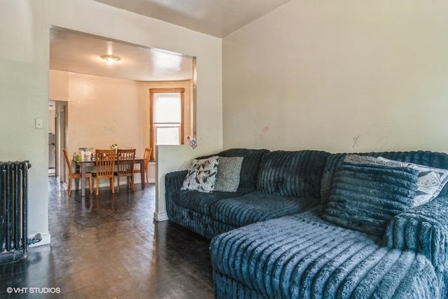 6151 S Marshfield Ave, Chicago, IL 60636 - living area with concrete flooring and radiator heating unit