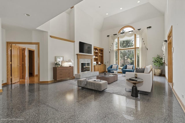 1773 W Whispering Ct, Addison, IL 60101 - living area with a towering ceiling, a high end fireplace, granite tiled floors, and recessed lighting