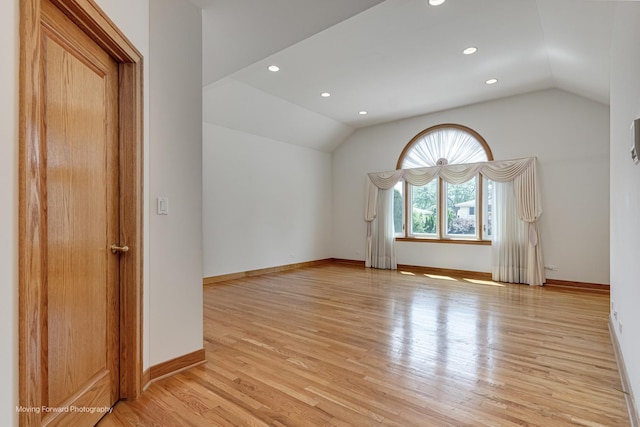 1773 W Whispering Ct, Addison, IL 60101 - unfurnished room with vaulted ceiling, light wood-style flooring, and recessed lighting