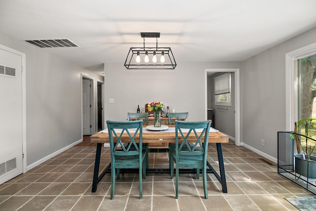 1274 Theresa Ln, Bourbonnais, IL 60914 - dining area featuring healthy amount of natural light and baseboards
