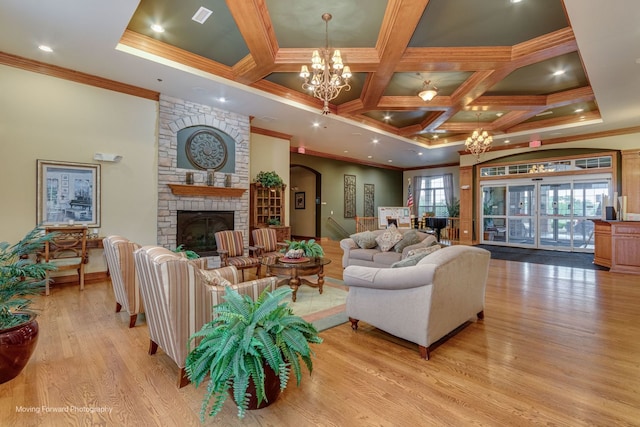 17016 Delevan St, Lockport, IL 60441 - living area featuring crown molding, a chandelier, wood finished floors, a fireplace, and coffered ceiling