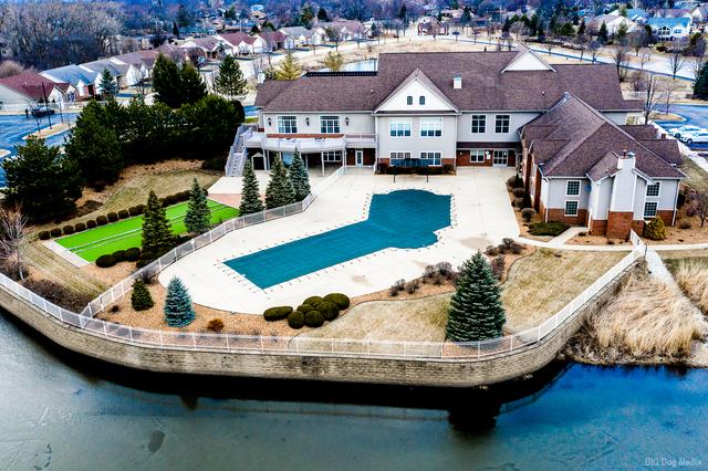 17016 Delevan St, Lockport, IL 60441 - aerial view of property and surrounding area with a pool area
