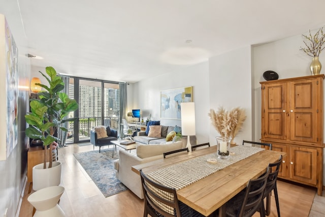 330 N Jefferson St Unit 1002, Chicago, IL 60661 - dining room featuring expansive windows