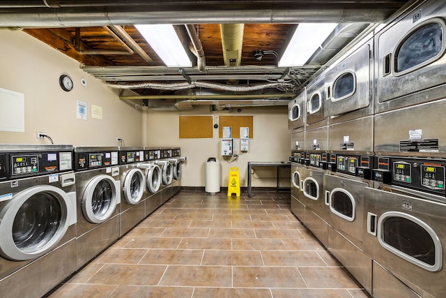 225 W Huron St Unit 413, Chicago, IL 60654 - shared laundry room with stacked washer / dryer and washer and dryer