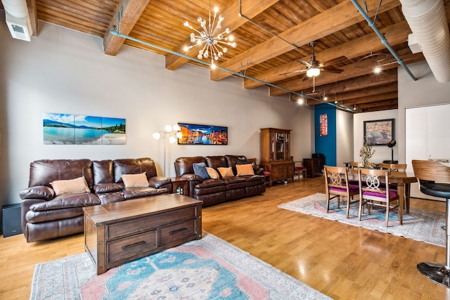 225 W Huron St Unit 413, Chicago, IL 60654 - living area with wood ceiling with exposed beams, light wood-type flooring, a chandelier, and ceiling fan