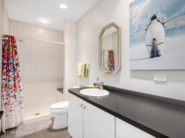 5951 S Grant St, Burr Ridge, IL 60527 - bathroom with a tile shower, tile patterned flooring, vanity, toilet, and recessed lighting