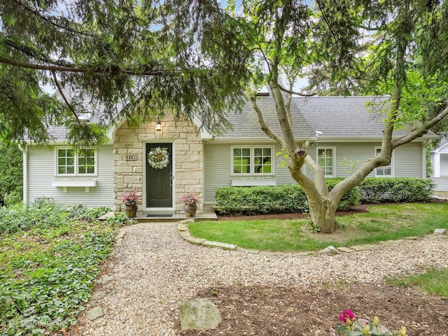 5951 S Grant St, Burr Ridge, IL 60527 - view of front facade featuring stone siding and a shingled roof