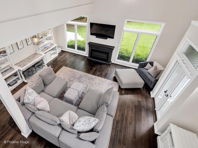 5951 S Grant St, Burr Ridge, IL 60527 - living room with healthy amount of natural light, dark wood finished floors, and a fireplace