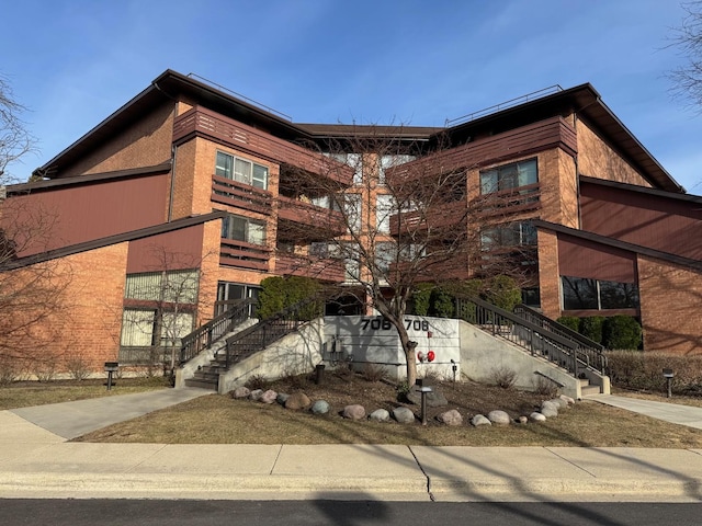 706 Waukegan Rd Unit 403C, Glenview, IL 60025 - view of building exterior with stairway