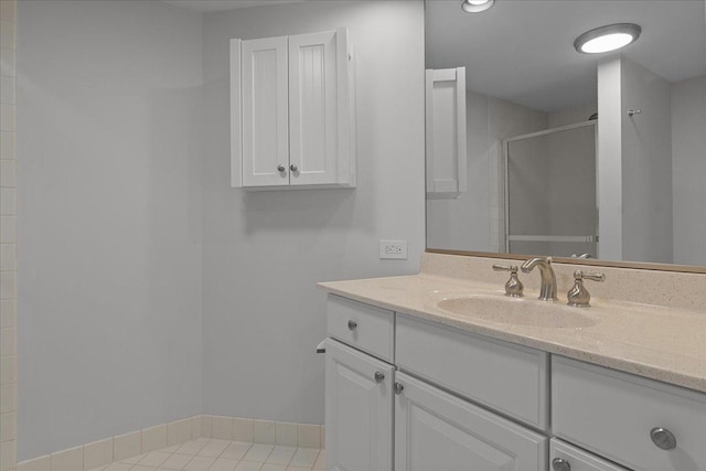 706 Waukegan Rd Unit 403C, Glenview, IL 60025 - full bath with a stall shower, vanity, and baseboards