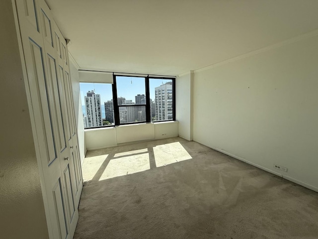 1560 N Sandburg Ter Unit 2704, Chicago, IL 60610 - carpeted spare room with a view of skyline and crown molding
