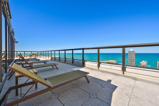 1560 N Sandburg Ter Unit 2704, Chicago, IL 60610 - view of patio featuring view of water and beach