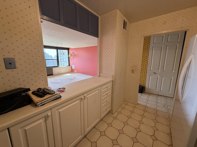 1560 N Sandburg Ter Unit 2704, Chicago, IL 60610 - bathroom with wallpapered walls and tile patterned floors