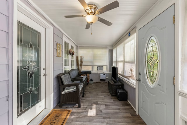 1028 5th St, Aurora, IL 60505 - sunroom featuring wood finished floors, a ceiling fan, cooling unit, and ornamental molding