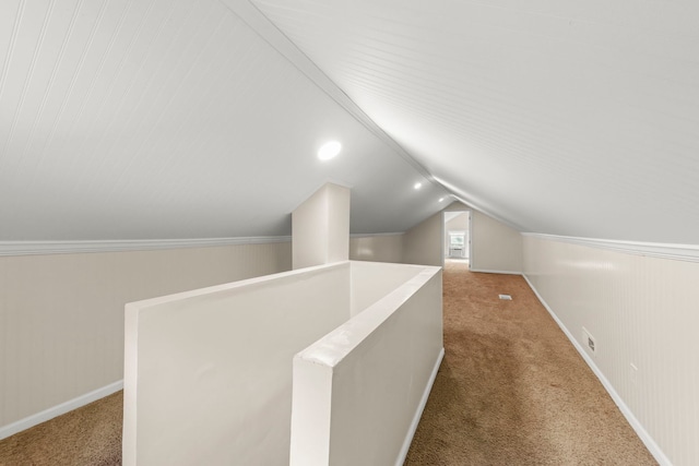 1028 5th St, Aurora, IL 60505 - additional living space featuring carpet, vaulted ceiling, and baseboards