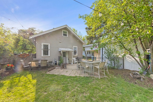 1028 5th St, Aurora, IL 60505 - back of house featuring a patio area and outdoor dining space