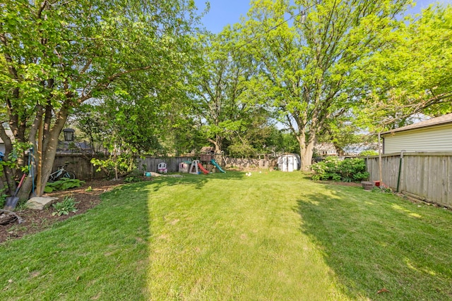 1028 5th St, Aurora, IL 60505 - view of yard with a playground