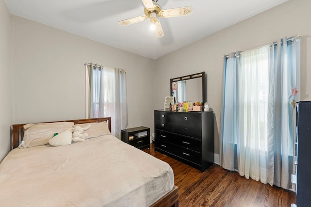 1028 5th St, Aurora, IL 60505 - bedroom featuring dark wood-style floors and a ceiling fan