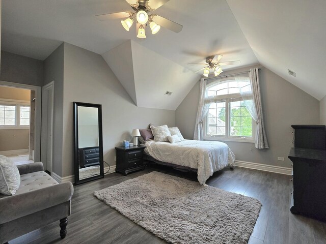 501 Siesta Dr, New Lenox, IL 60451 - bedroom with lofted ceiling, baseboards, dark wood-style flooring, and a ceiling fan