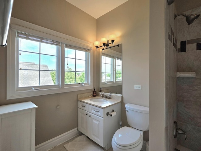 501 Siesta Dr, New Lenox, IL 60451 - bathroom featuring vanity, a tile shower, toilet, and baseboards