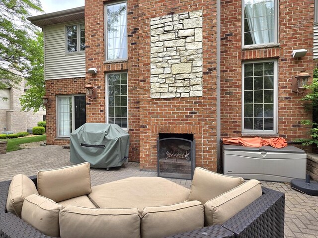 501 Siesta Dr, New Lenox, IL 60451 - view of patio / terrace with a grill and an outdoor living space with a fireplace