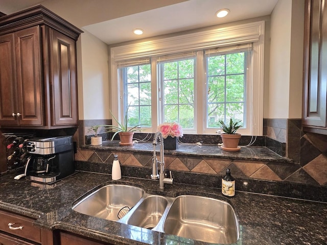 501 Siesta Dr, New Lenox, IL 60451 - kitchen featuring a sink, plenty of natural light, dark stone counters, dark brown cabinets, and recessed lighting