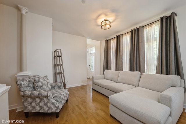 6247 Lincoln Ave Unit 6-3, Morton Grove, IL 60053 - living room featuring light wood-style flooring and baseboards