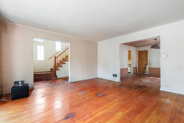 1571 W 100th Pl, Chicago, IL 60643 - unfurnished living room with hardwood / wood-style flooring, stairway, ornamental molding, and baseboards