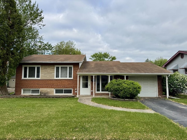 824 Dartmouth Ave, Matteson, IL 60443 - tri-level home with a garage, driveway, a front lawn, a shingled roof, and brick siding