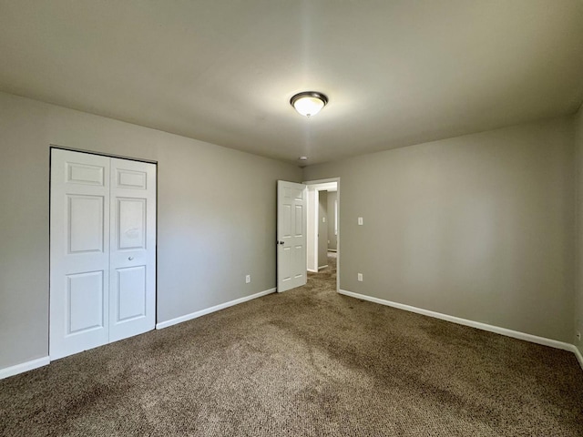 824 Dartmouth Ave, Matteson, IL 60443 - unfurnished bedroom featuring carpet floors, baseboards, and a closet