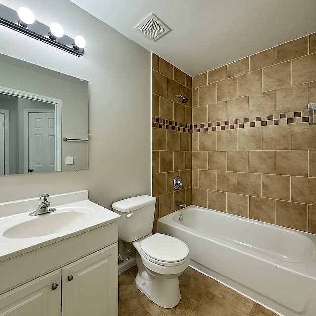 824 Dartmouth Ave, Matteson, IL 60443 - bathroom with toilet, vanity, tub / shower combination, and tile patterned flooring