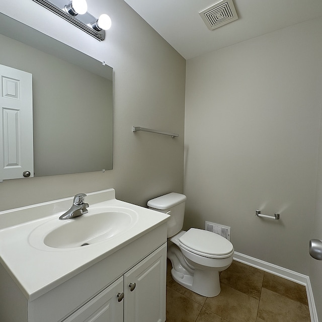 824 Dartmouth Ave, Matteson, IL 60443 - half bathroom with toilet, vanity, tile patterned flooring, and baseboards