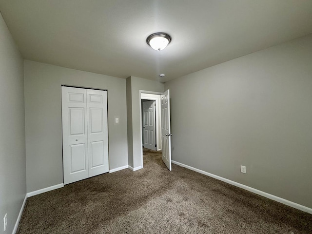 824 Dartmouth Ave, Matteson, IL 60443 - unfurnished bedroom featuring baseboards, carpet flooring, and a closet