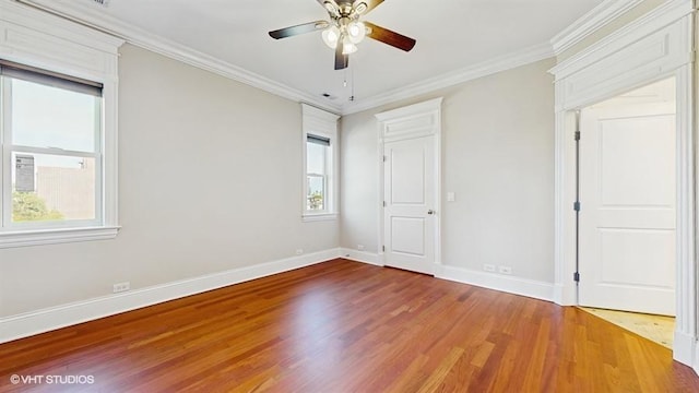 2540 W Diversey Ave Unit 404, Chicago, IL 60647 - unfurnished bedroom featuring wood finished floors, baseboards, ornamental molding, and ceiling fan