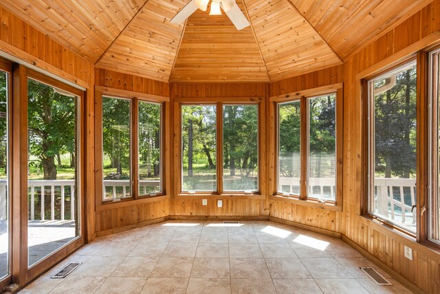 2946 County Road 800 E, Dewey, IL 61840 - unfurnished sunroom with vaulted ceiling, wooden walls, tile patterned flooring, and wooden ceiling