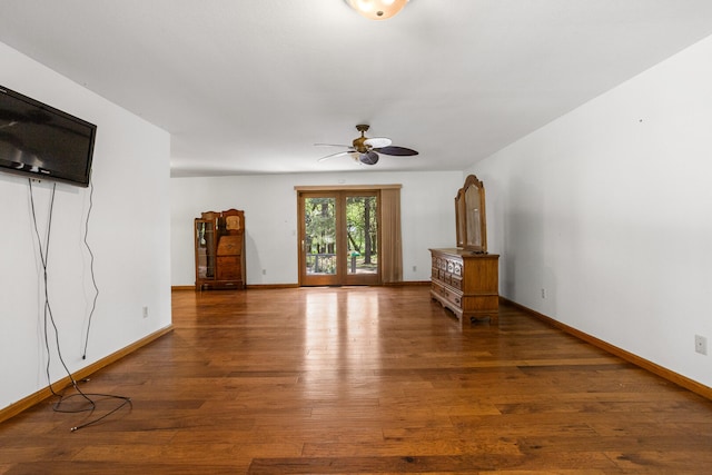 2946 County Road 800 E, Dewey, IL 61840 - unfurnished living room with a ceiling fan, hardwood / wood-style flooring, and baseboards