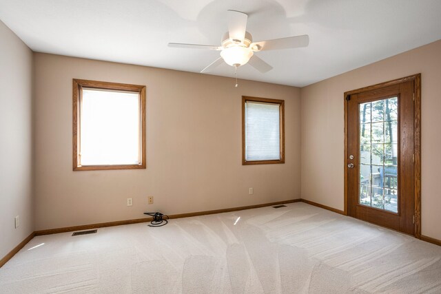 2946 County Road 800 E, Dewey, IL 61840 - unfurnished room with baseboards, carpet, and ceiling fan